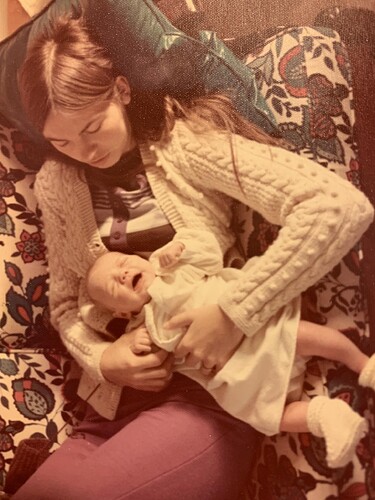 Becky Ericson holding Jon Ericson when he was a baby.